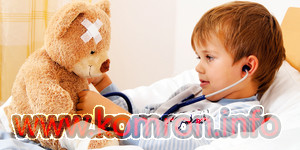 a sick child examined teddy with stethoscope