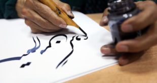 writing_arabic_calligraphy_with_ink_by_by_zhenia_perutska_0